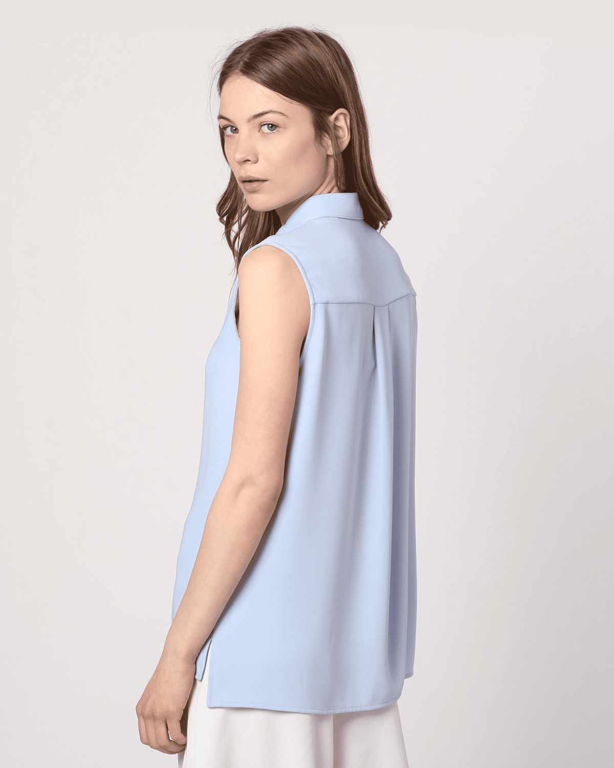 Blusa mujer, camisa sin mangas, fluida elegante, cuello camisero, azul claro, tejido ligero, cierre botones, favorece silueta, cómoda, talla XS, ideal oficina o diario, ✅Entrega 24/48h