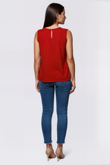 Blusa sin mangas con volante en el cuello