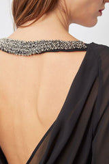 Blusa escotada en la espalda