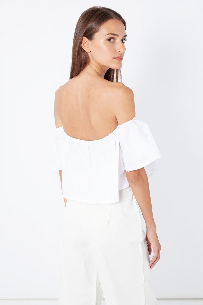 Blusa off shoulder mujer volante blanca, top hombros descubiertos algodón ligero, corte crop casual, aireada y elegante, ideal para verano, disponible talla L, look versátil fresco, combina jeans o falda. ✅Entrega 24/48h