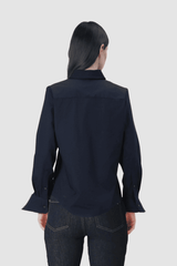 Blusa con volante