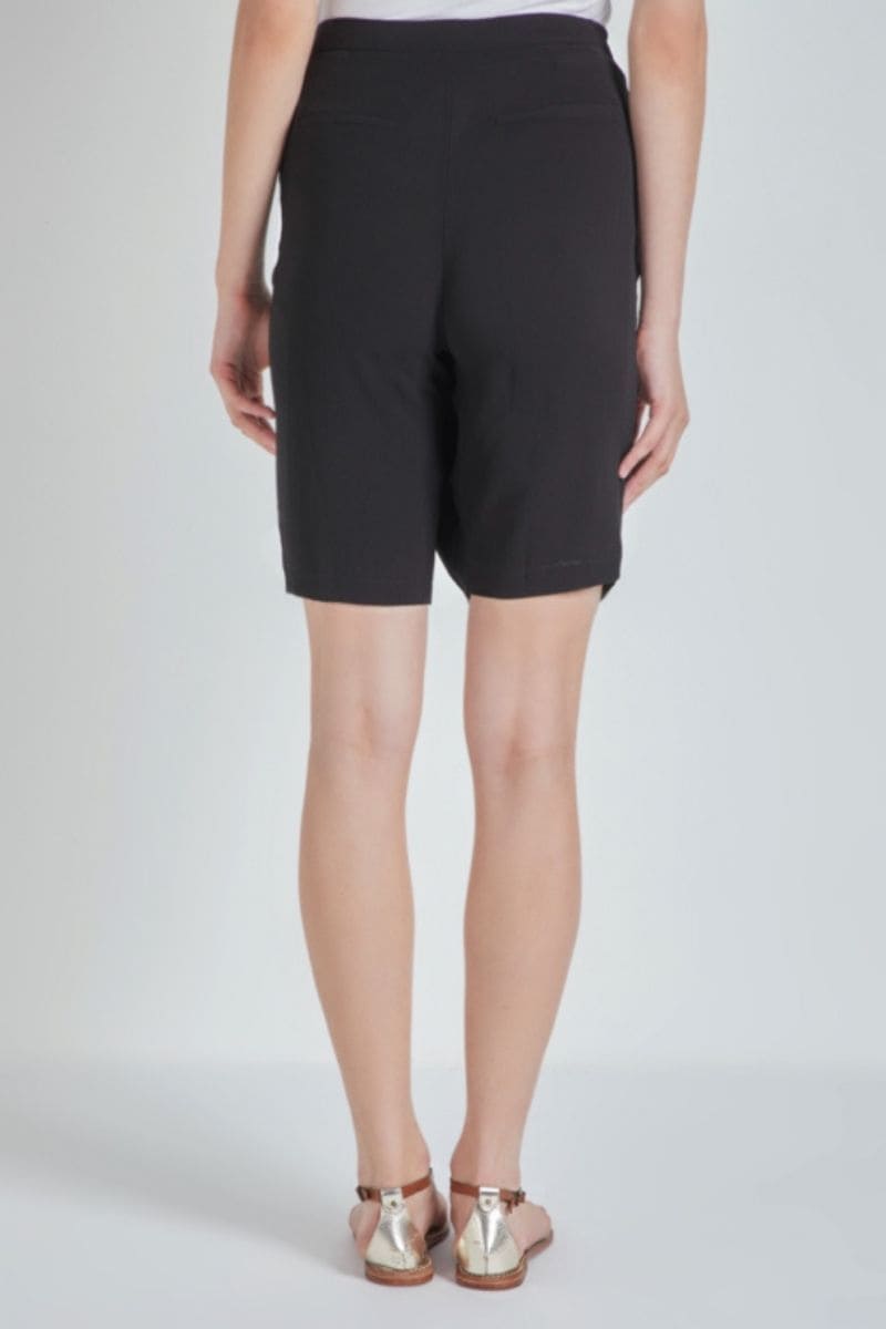 Falda corta cruzada mujer, minifalda elegante fluida, tela ligera, estilo sofisticado, corte wrap, color negro, talla 38, versátil urbana casual, fácil combinar, ideal eventos y día a día ✅Entrega 24/48h