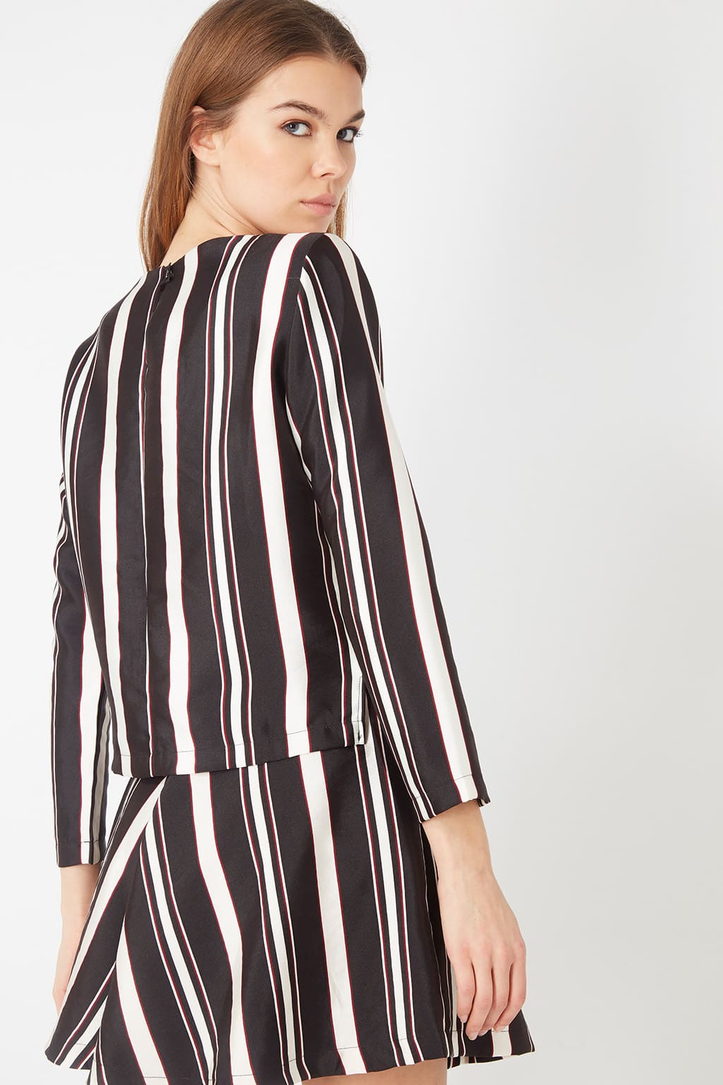 Conjunto mujer blusa manga larga falda corta rayas verticales moderno elegante tejido ligero cómodo outfit eventos sociales L negro ideal look sofisticado ✅Entrega 24/48h
