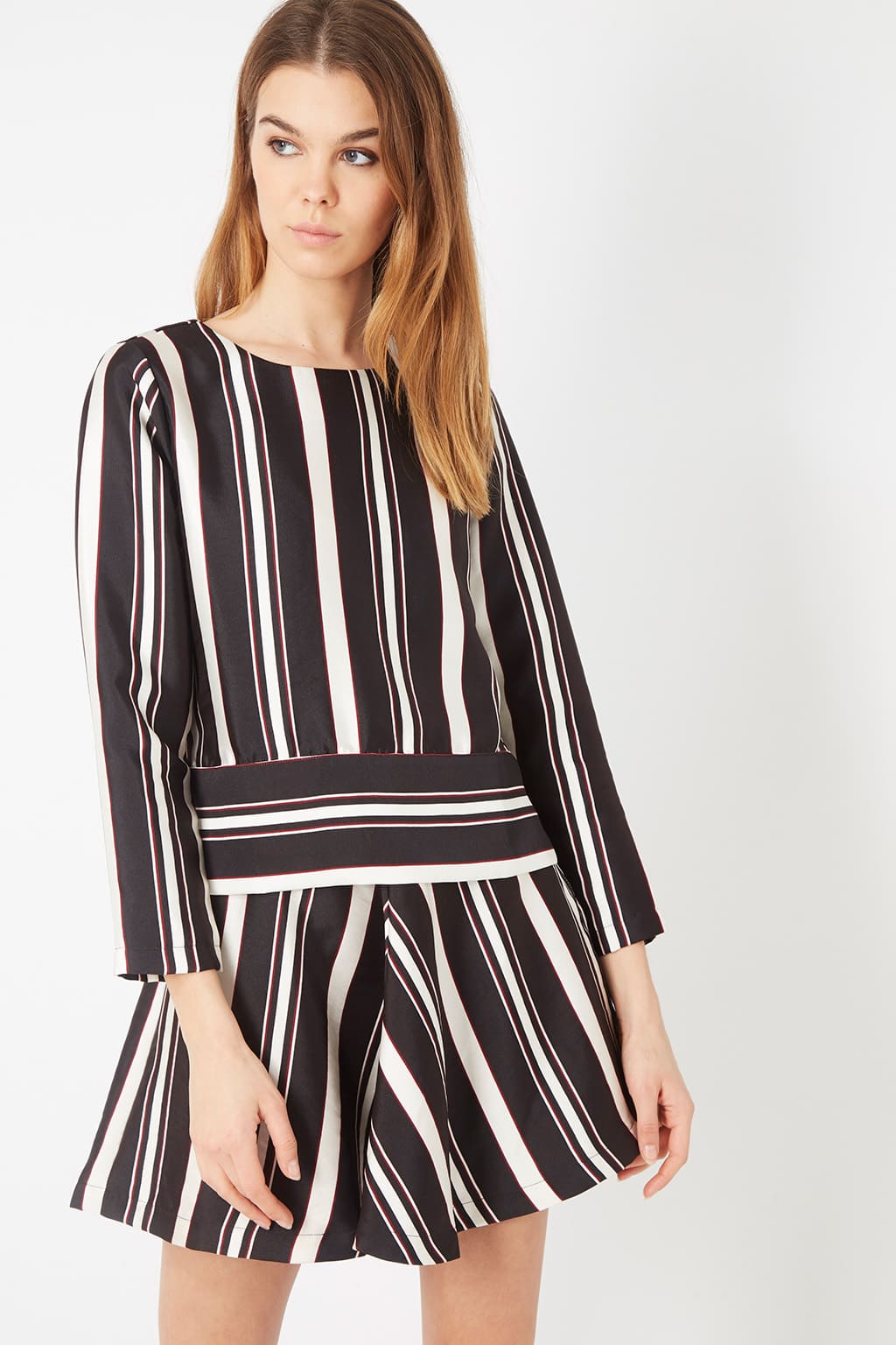Conjunto mujer blusa manga larga falda corta rayas verticales moderno elegante tejido ligero cómodo outfit eventos sociales L negro ideal look sofisticado ✅Entrega 24/48h