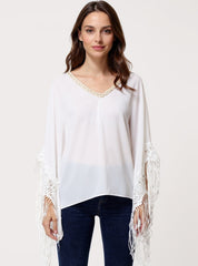 Blusa mujer asimétrica fluida, poncho bohemio, cuello pico trenzado, flecos largos, manga murciélago, estilo elegante casual, talla 38, color blanco, versátil, ligera, ideal verano ✅Entrega 24/48h